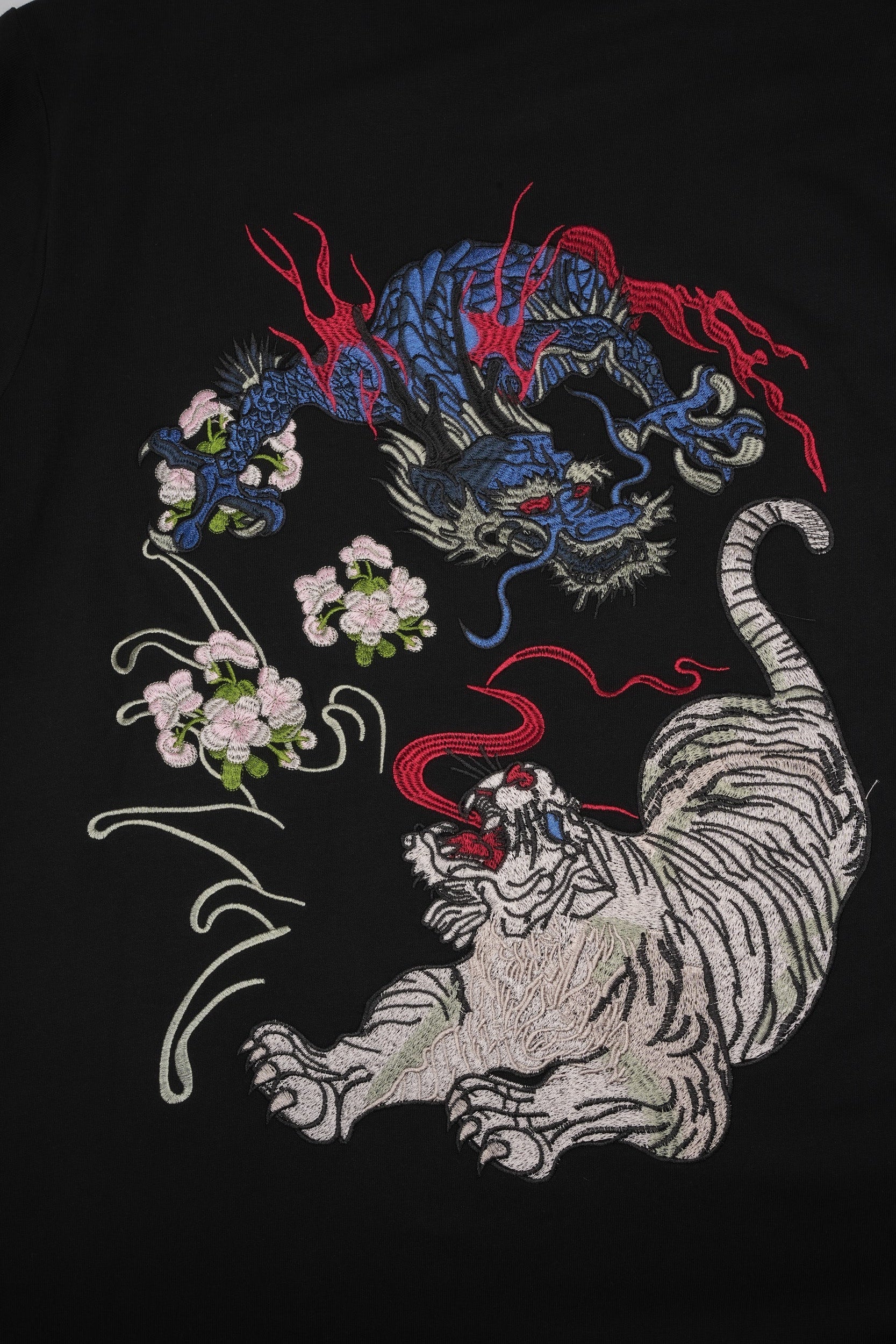 ET9977 War of Beasts Embroidered Tee